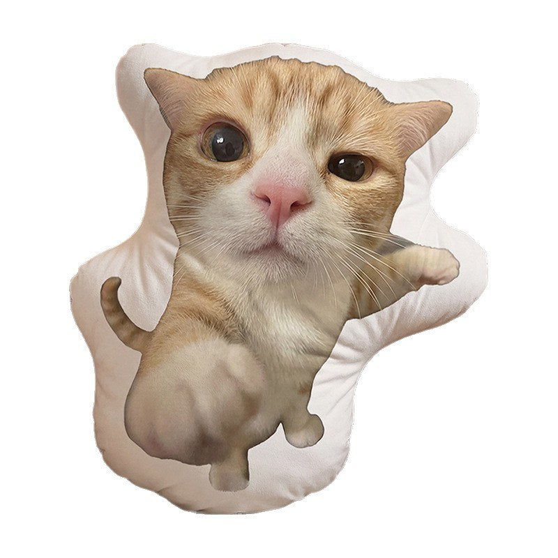 Custom shaped pet pillow made from a cream-and-orange cat photo